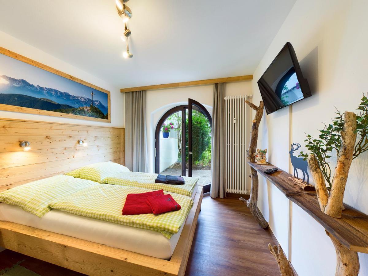 Bergwild Apartment การ์มิช-พาร์เทนเคียร์เชน ภายนอก รูปภาพ